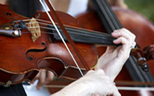A close-up of someone playing the violin.